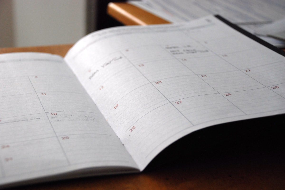 Open monthly planner representing a Notion AI blog content calendar for 2026
